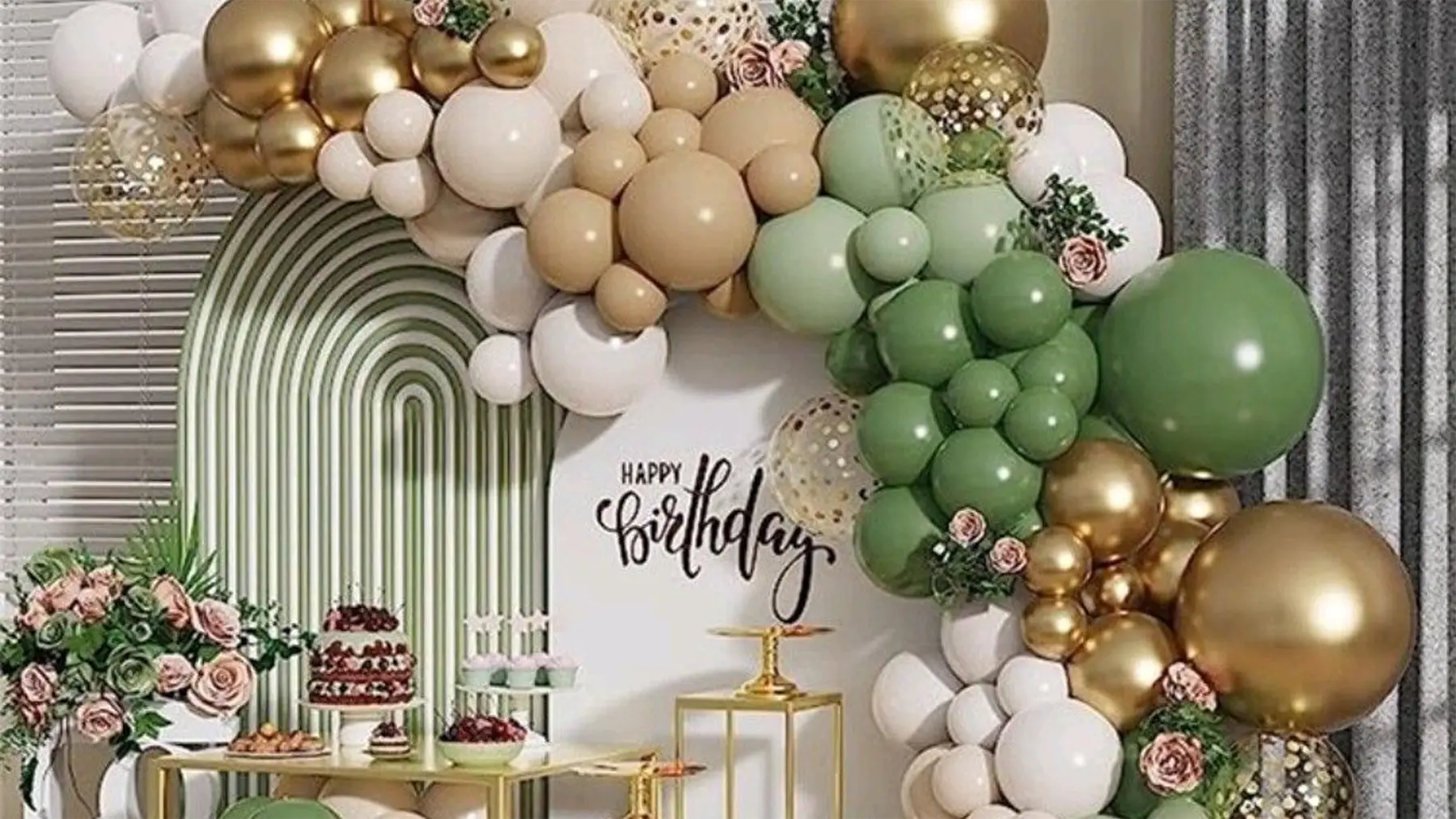 Birthday styling by Decoration X: Sage/beige balloon arch, 'Happy Birthday' sign, cake.