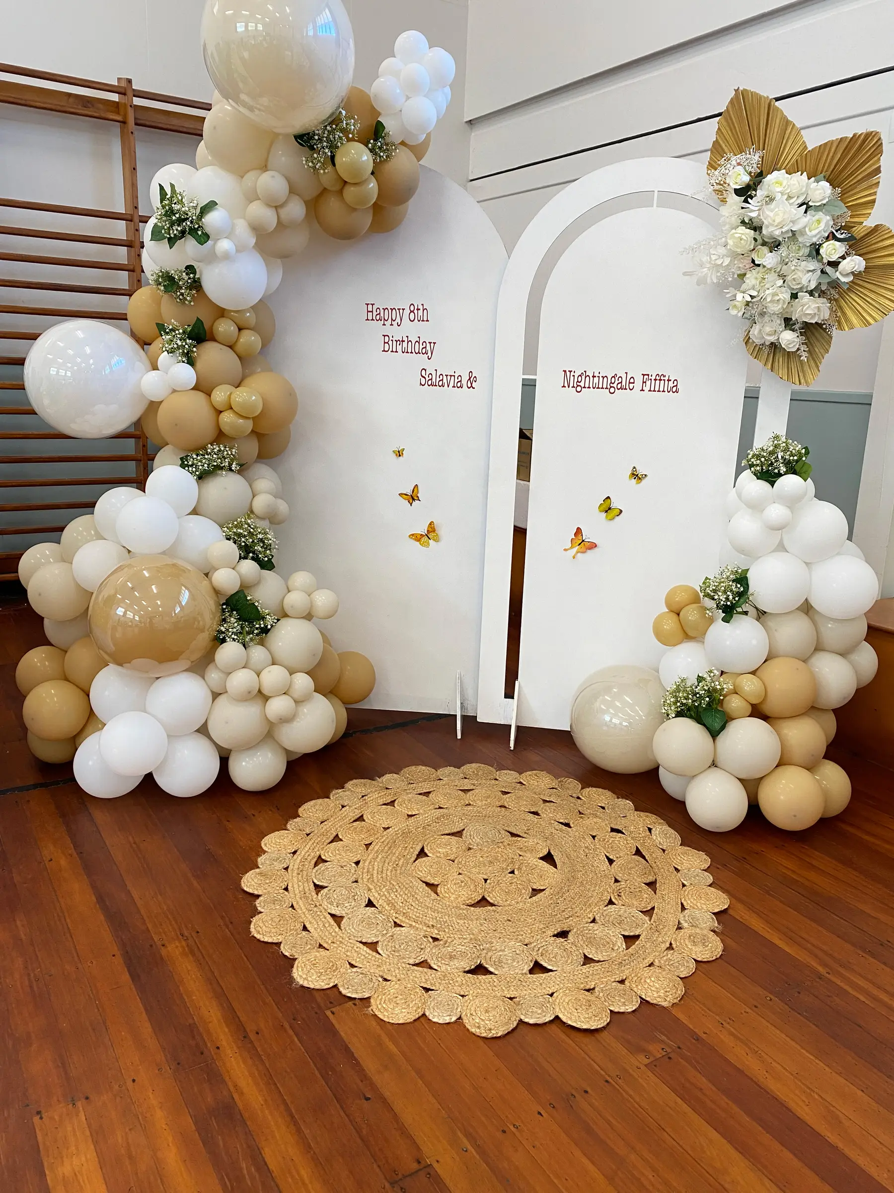 Birthday styling by Decoration X: 'Happy 6th Birthday' board, cream balloons, jute rug.